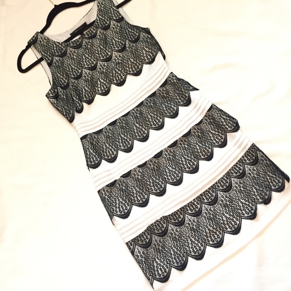 white dress with black lace overlay